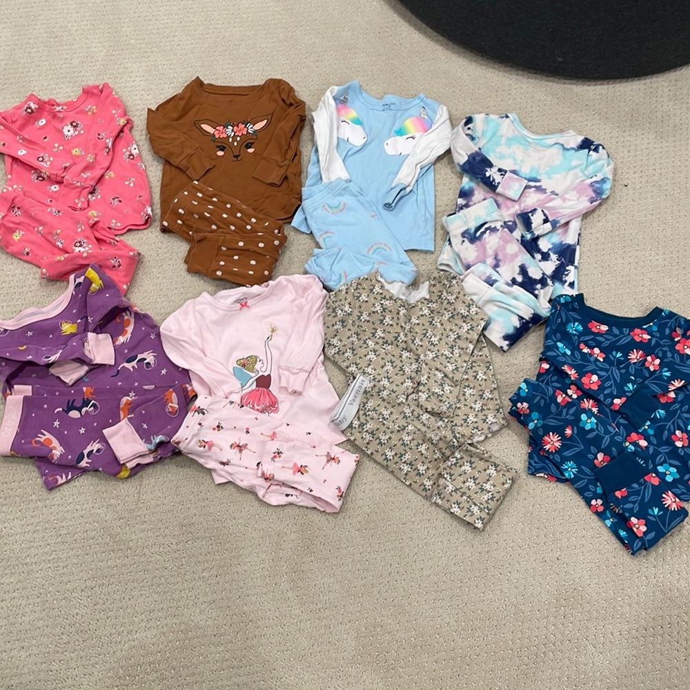 Bundle of 8 pajamas sizing 18 months for baby girl.